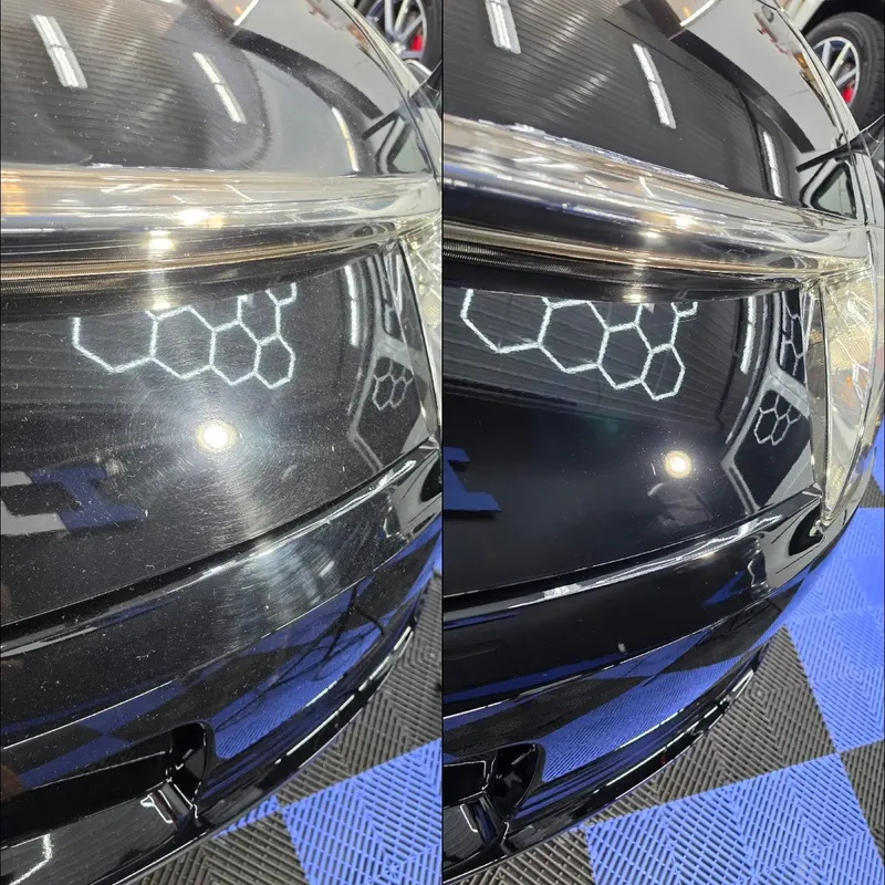 Paint correction before and after — swirled black paint on the left, mirror finish on the right